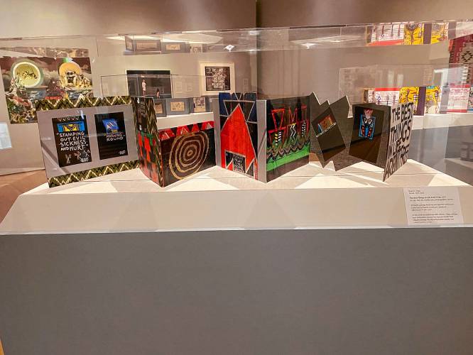 “22 Million Beers Powered by the Sun,” accordion book display by Brian D. Tripp. Part of “Boundless” at the Mead Art Museum.