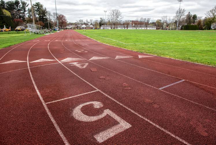 The Amherst Regional School Committee this week narrowly rescinded a $1.5 million borrowing authorization for a $4.7 million project that would reorient and expand the high school track and rebuilding its interior playing field.  